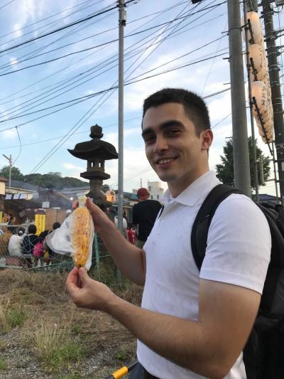 Eating corn at a festival