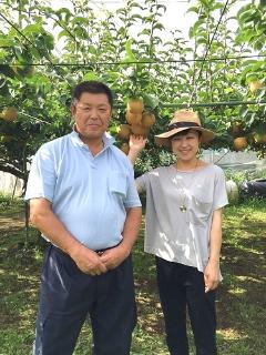 高橋さんとDJの酒井さんと高春園の写真