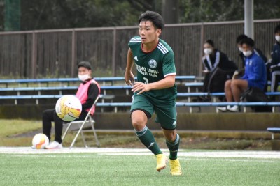 吉田選手のプレー写真